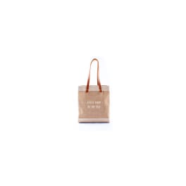 Beige tote bag with brown handles and printed text