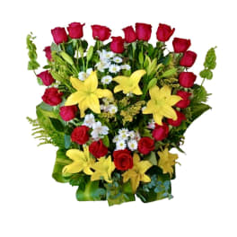 Bouquet of red roses and yellow lilies with small white daisies