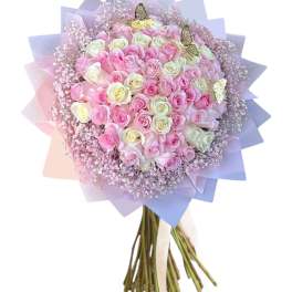 Bouquet of pink and white roses wrapped in pastel paper
