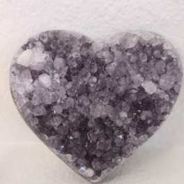 Heart-shaped crystal ornament with purple and clear stones