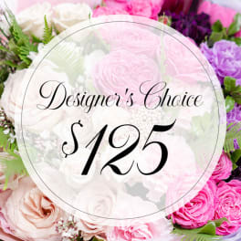 Mixed bouquet of pink, white, and purple flowers with a $125 designer choice label