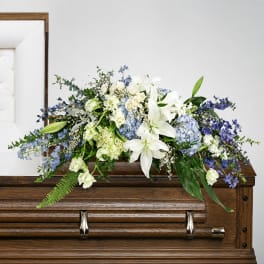 Angelic embrace casket spray
