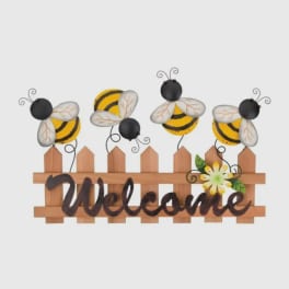 Bee-themed wooden welcome sign with decorative bees and a flower accent