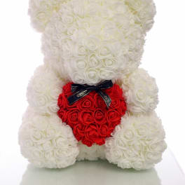 White rose teddy bear holding a red rose heart