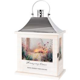 White lantern with floral artwork and the words Amazing Grace