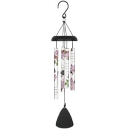 Black hanging wind chime with floral-printed tubes and a bell