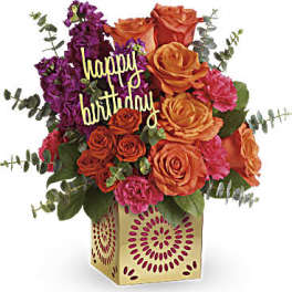 Birthday bouquet of orange and purple roses in a decorative box