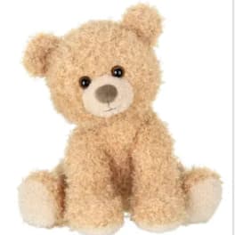 Tan teddy bear plush toy sitting upright