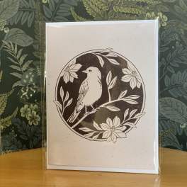 Greeting card with a bird and floral line art