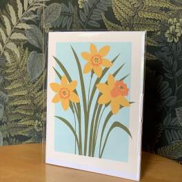 Greeting card with stylized yellow flowers on a blue background