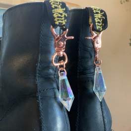 Black boots with dangling crystal charms
