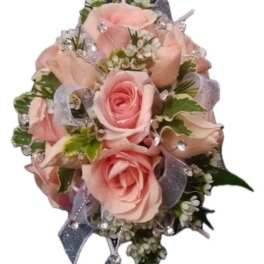 Pink rose bouquet with ribbon and rhinestone accents