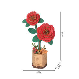 Wooden flower model with two red blossoms in a small box
