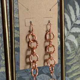 Pair of dangling geometric earrings with clear cube charms