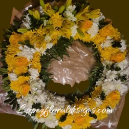Yellow and white floral wreath with roses and chrysanthemums
