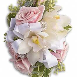 Pink roses and white orchids with a lavender ribbon
