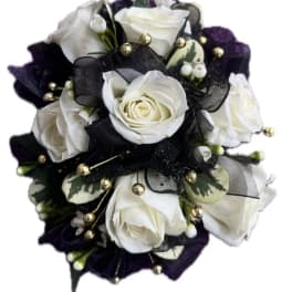 White roses with black ribbon and gold accents