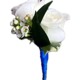 White rose boutonniere with small white blossoms and blue wrapped stem