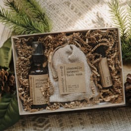 Gift box with bath soak, pillow mist, and a small bottle of blend