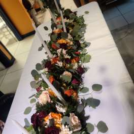 Elegant long table center piece for special events sold by foot $55.00