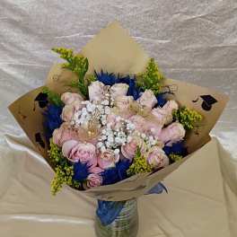 Two dozen pink roses for graduation style blue bouquet