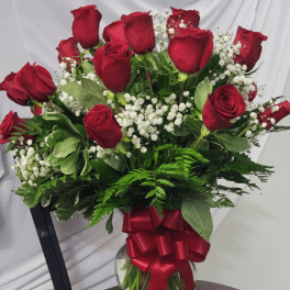 Classic two dozen red roses in vase
