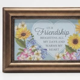 Framed friendship sign with painted flowers and a heart-shaped message