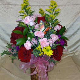Beautiful red and pink arrangement with yellow flowers
