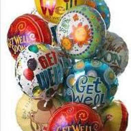 Cluster of colorful printed balloons with birthday messages
