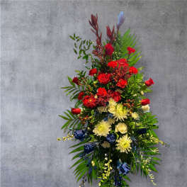 Tall floral spray with red, white, and blue flowers