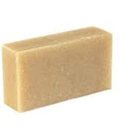 Rectangular block of beige soap on a white background