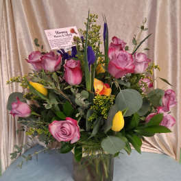 20 purple roses with tulips and mixed greens