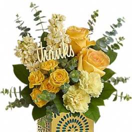 Yellow roses and cream flowers in a decorative gift box with a "thanks" sign