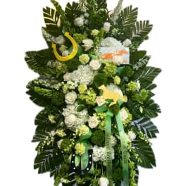 Standing funeral spray with white roses and green flowers