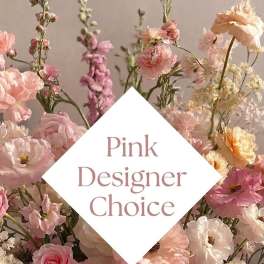 Pink and white mixed flowers with a "Pink Designer Choice" label