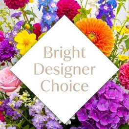 Bright mixed bouquet with dahlias, hydrangeas, roses, and blue delphinium