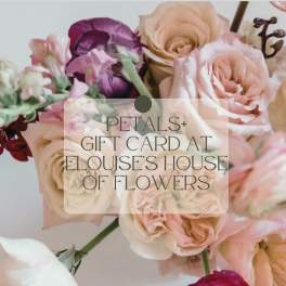 Gift card over a bouquet of blush, cream, and purple flowers