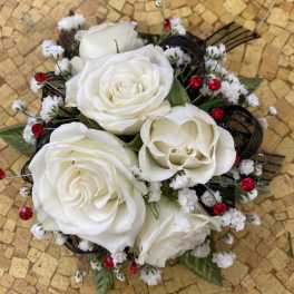Bouquet of white roses with small white filler flowers and red gem accents