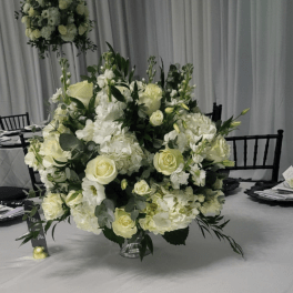Elegant special arrangement white center piece for special events
