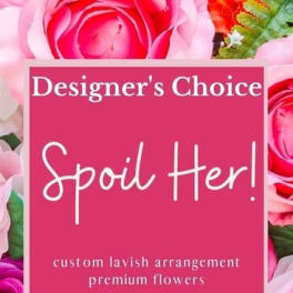 Pink designer's choice floral arrangement with roses and mixed blooms
