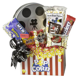Movie-themed gift basket with popcorn, candy, and a film reel decoration