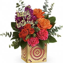 Birthday flower arrangement in a decorative gold box with roses and carnations