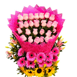 Bouquet of pink roses, pink gerbera daisies, and yellow sunflowers