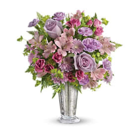 Lavender and pink bouquet in a clear glass vase