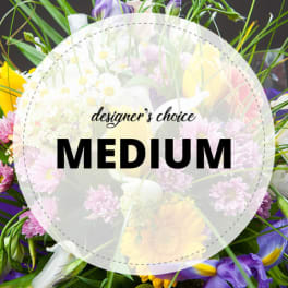 Mixed bouquet with pink, yellow, white, and purple flowers