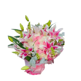 Pink and white bouquet with lilies and roses wrapped in pink paper