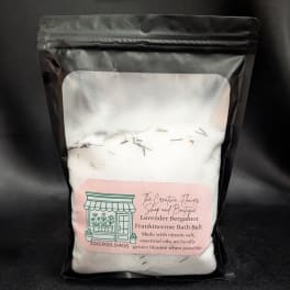Bag of lavender bergamot frankincense bath salt with a pink label
