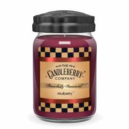 Purple candle in a glass jar with a black lid and label