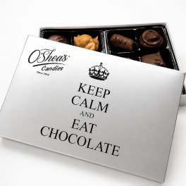 Box of assorted chocolates with a printed lid