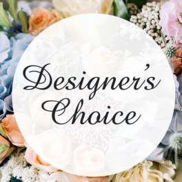 Round sign reading "Designer's Choice" surrounded by pastel flowers